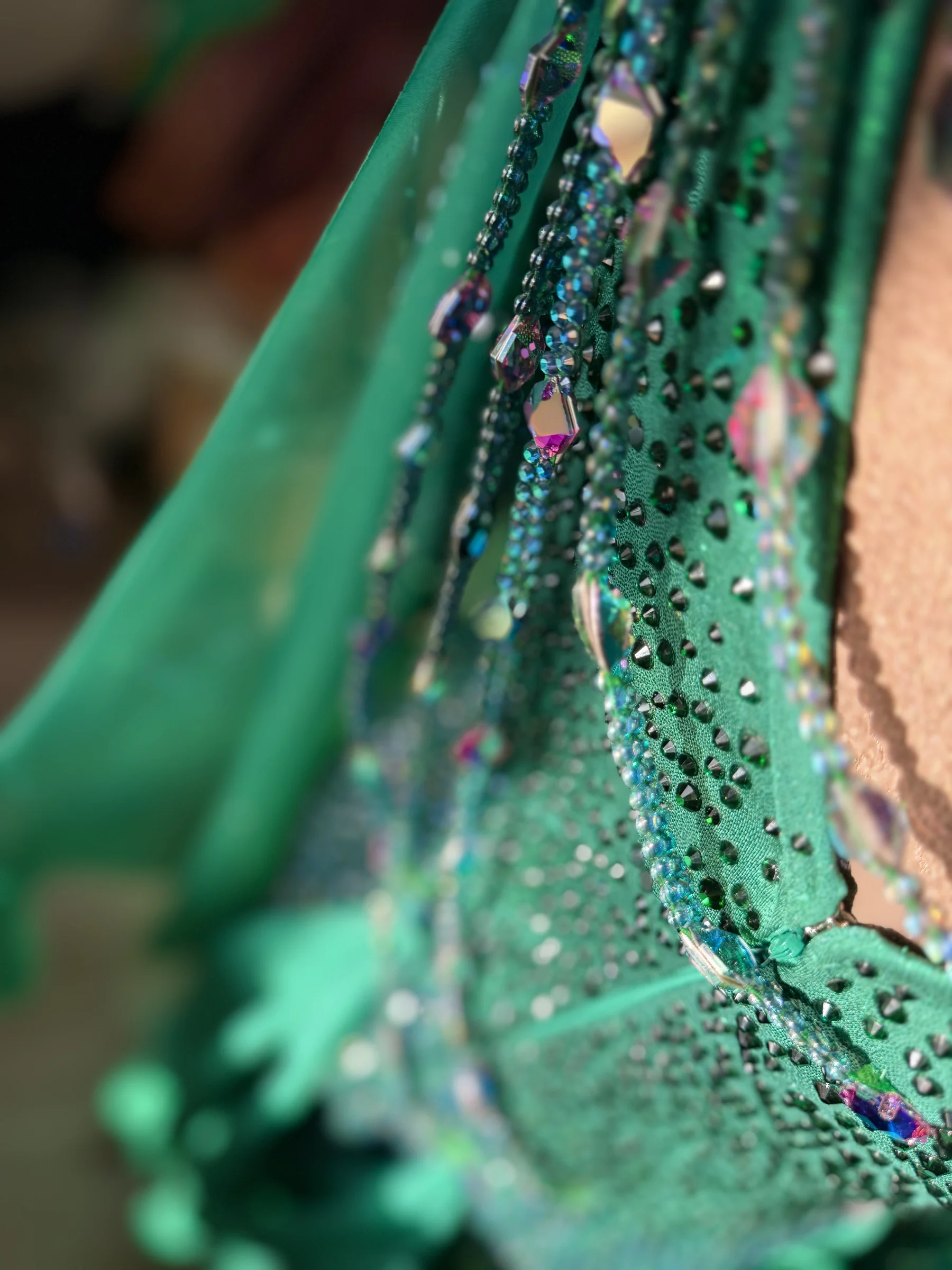 Close detail of Aurora crystals and beaded trim