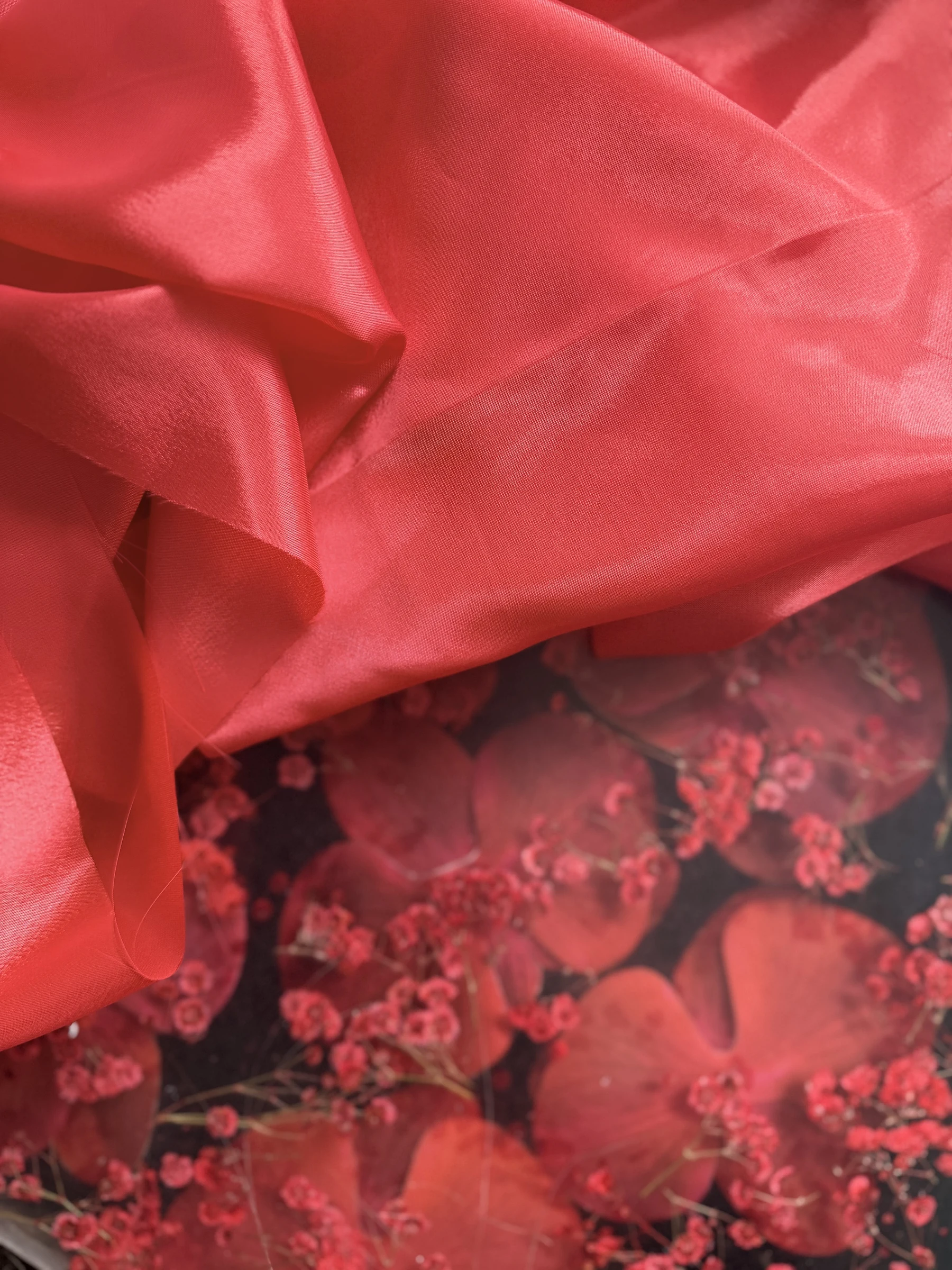 Layered crimson skirt fabrics