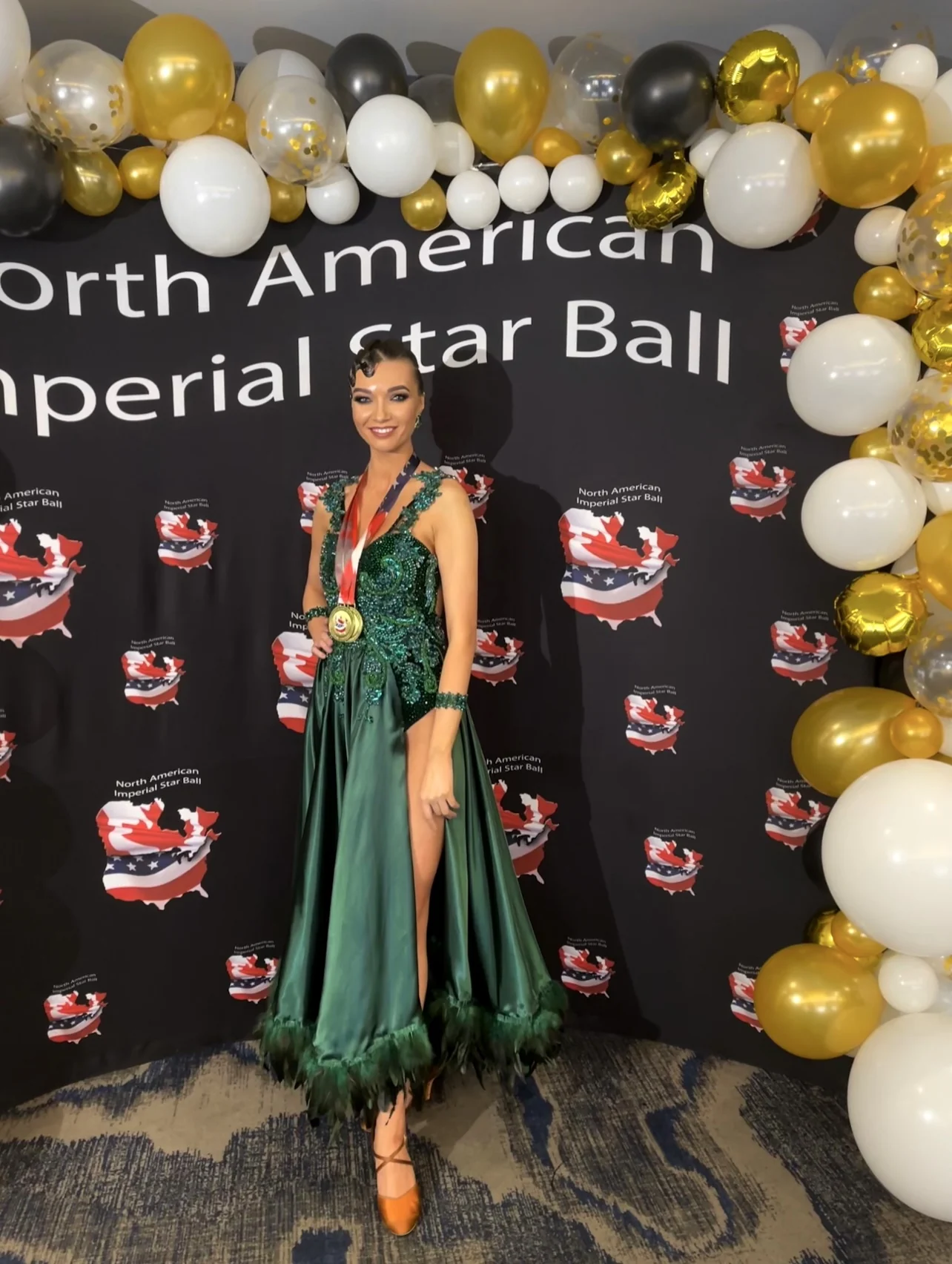 Emerald gown moving in competition