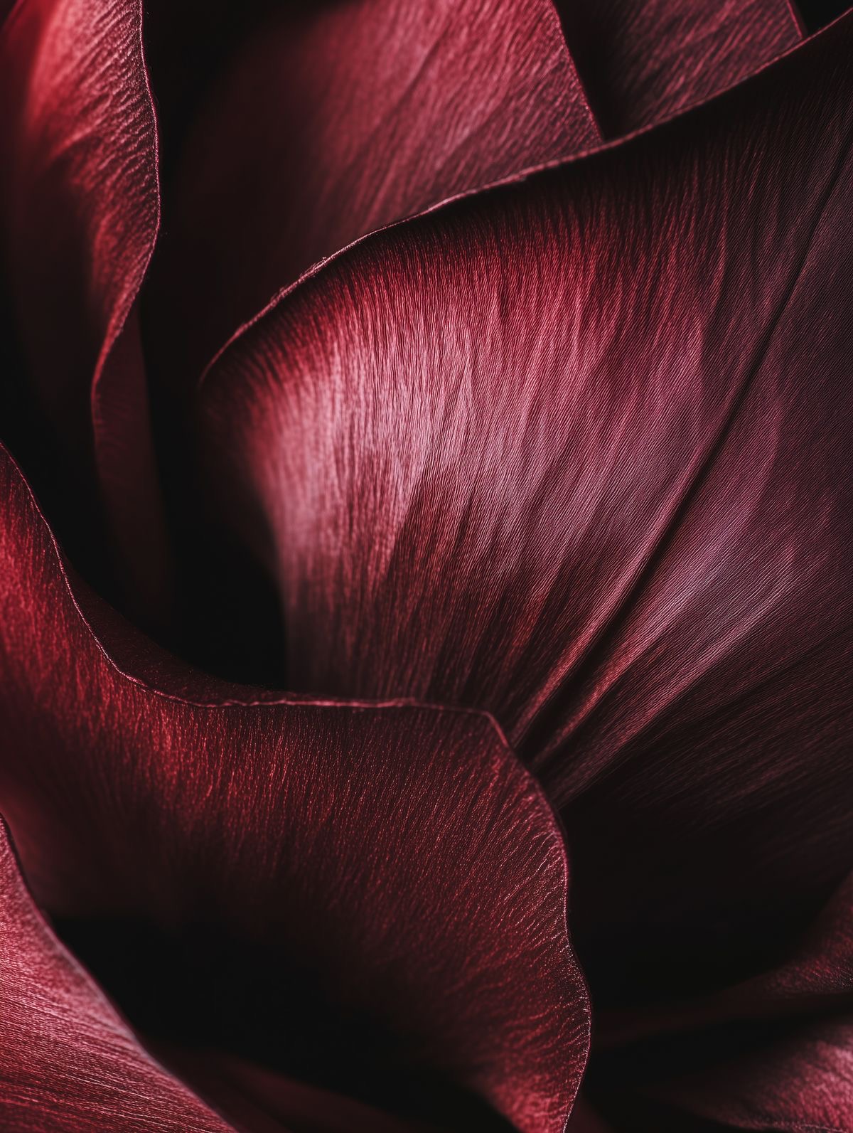 Burgundy faux-leather petals shaped for the gown