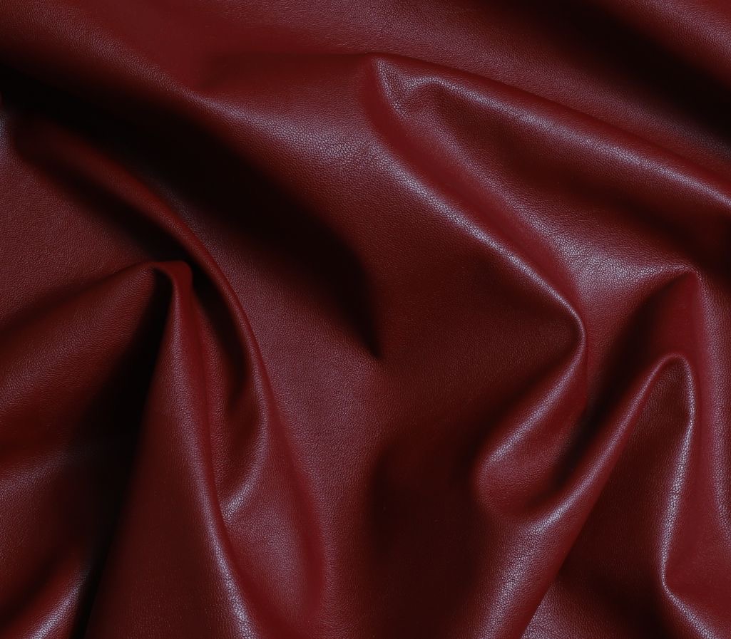 Wine-red faux leather selected for the gown
