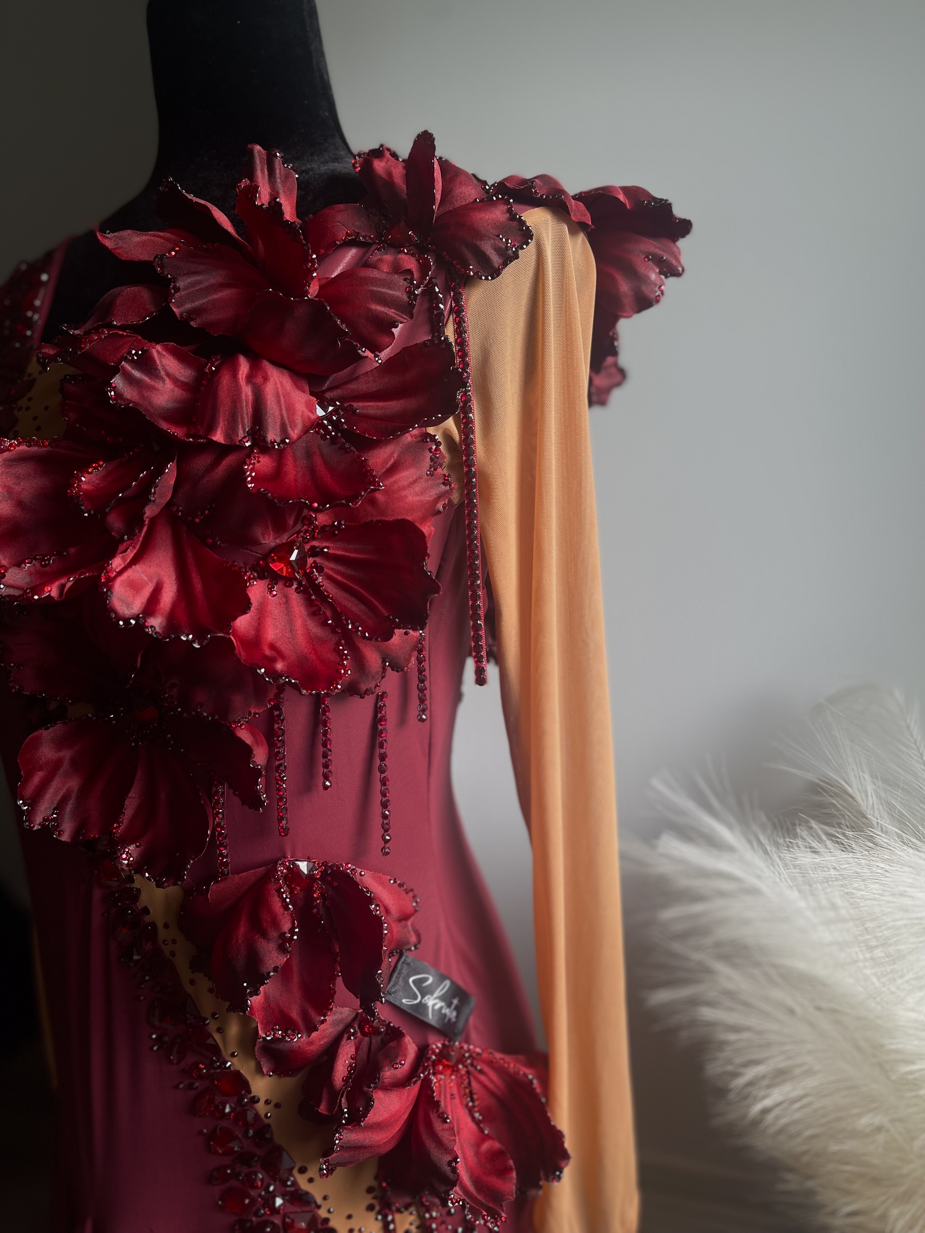 Burgundy Blossom displayed on a mannequin