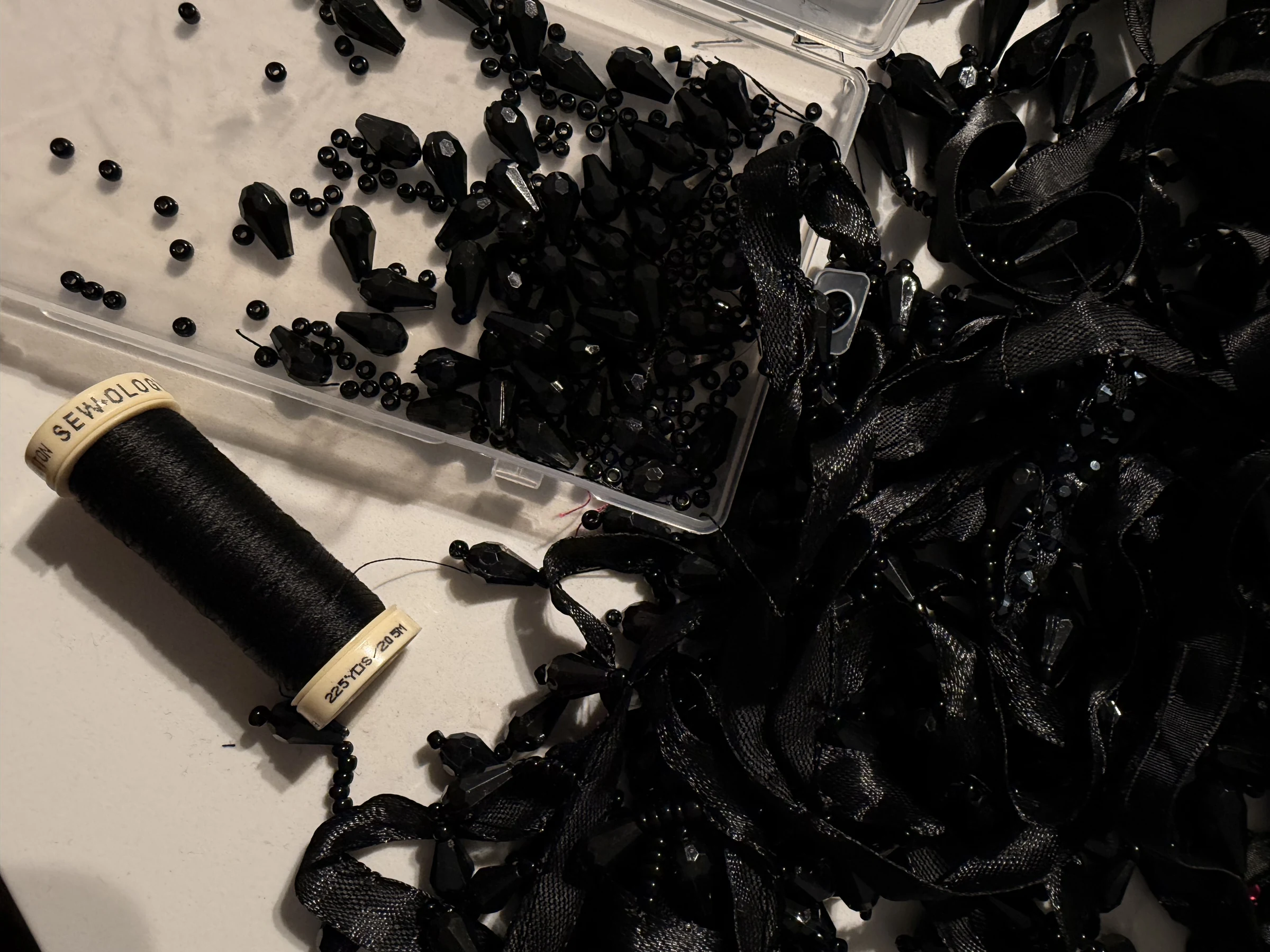 Black couture embellishment materials and crystal work